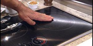 safely touching induction cooktop with bare hand